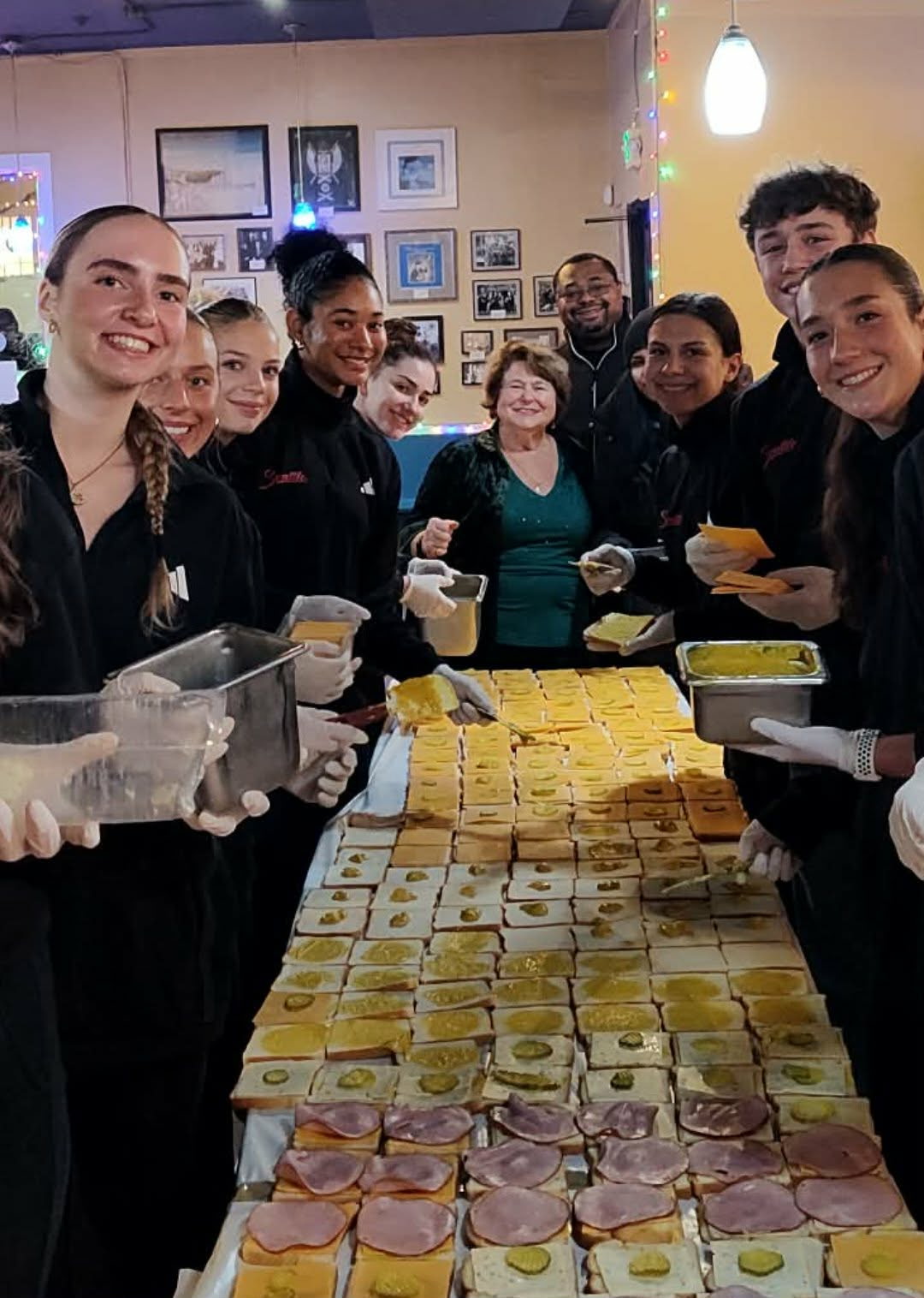 Basketball team scores big at Fremont Rotary sandwich night