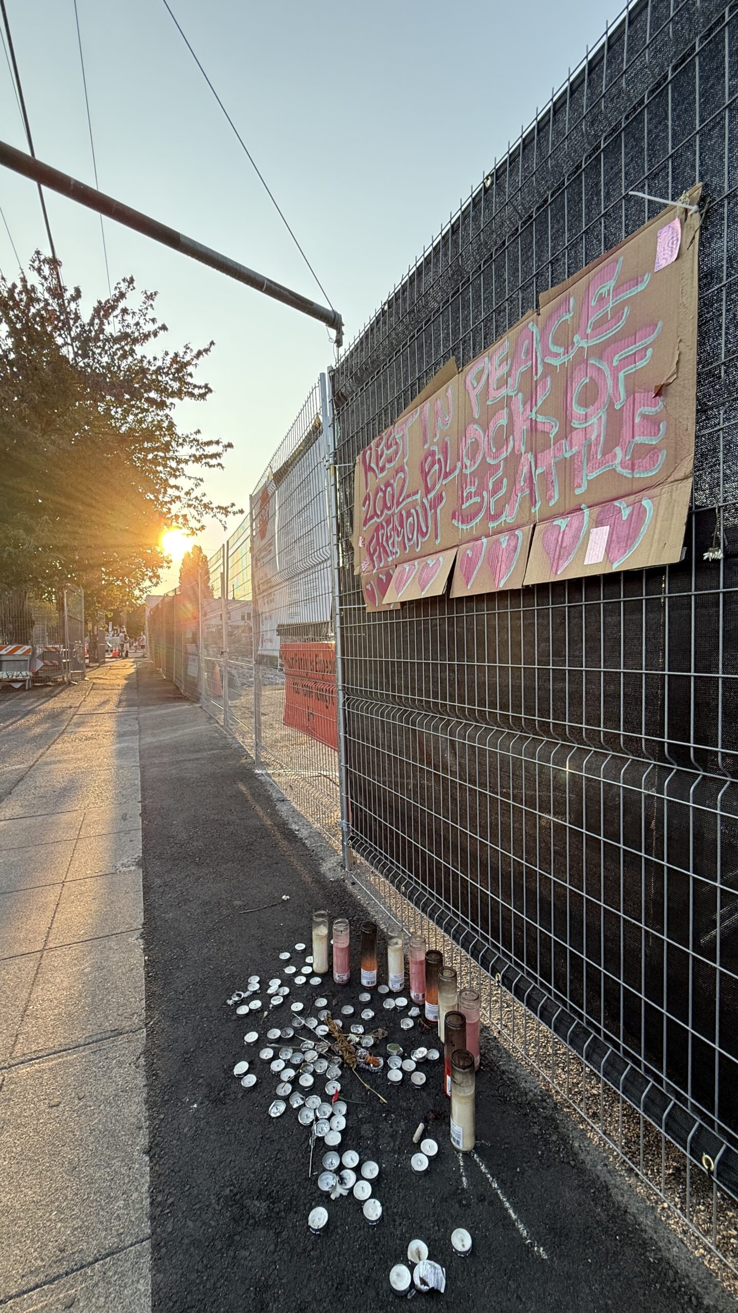 Neighbors leave memorial for the Ballroom block
